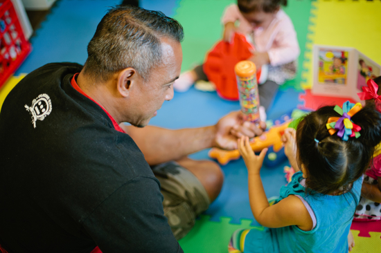Children's worker working with child